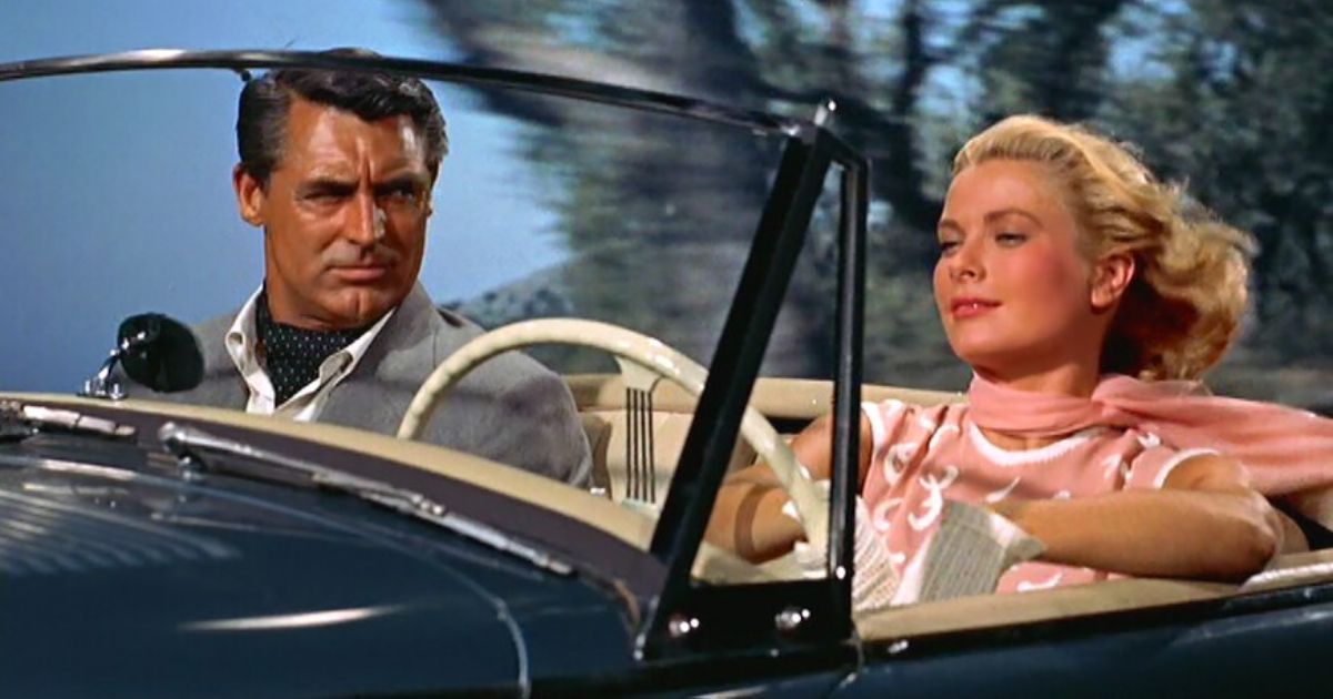 Cary Grant y Grace Kelly con el vestuario de Edith Head para Atrapar a un ladrón