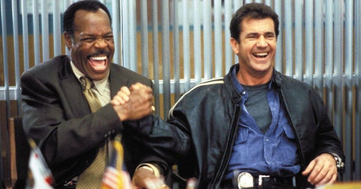 Mel Gibson y Danny Glover riendo